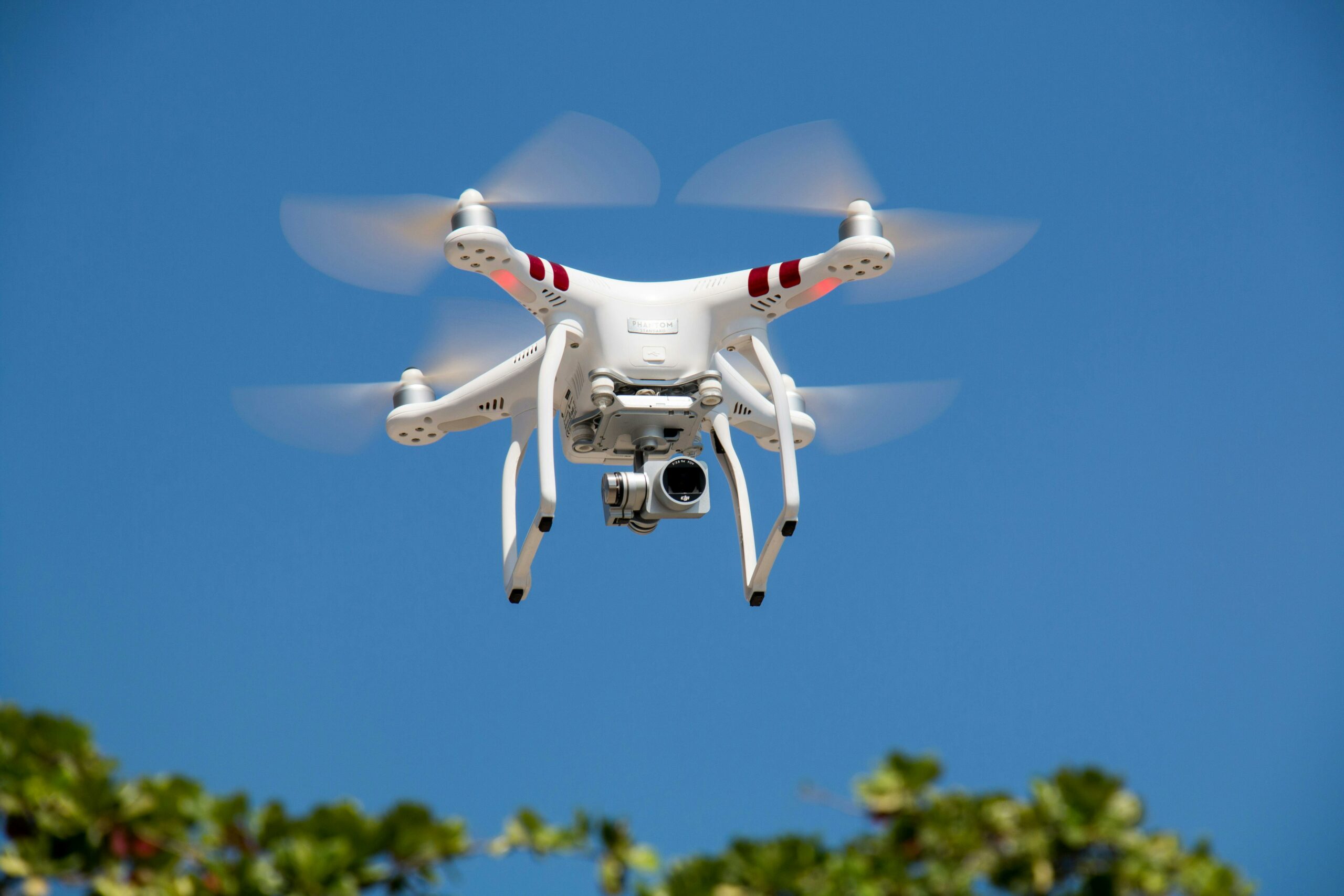 A flying drone, or unmanned aerial vehicle.