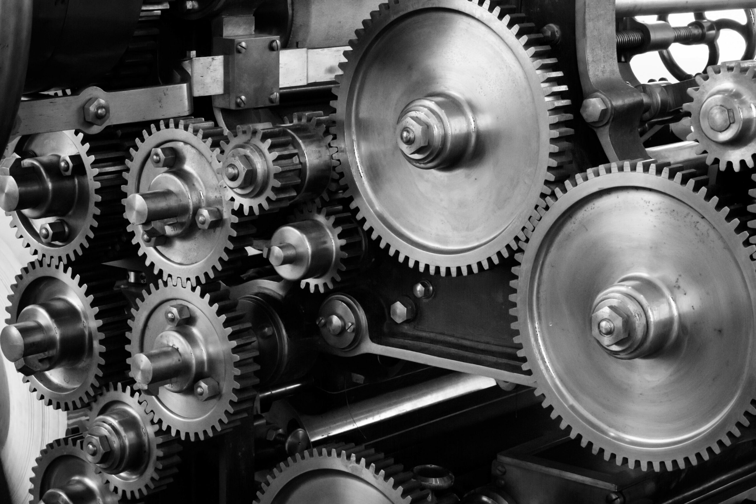 pexels-pixabay-159298 Complicated system of cogwheels used on an engine.