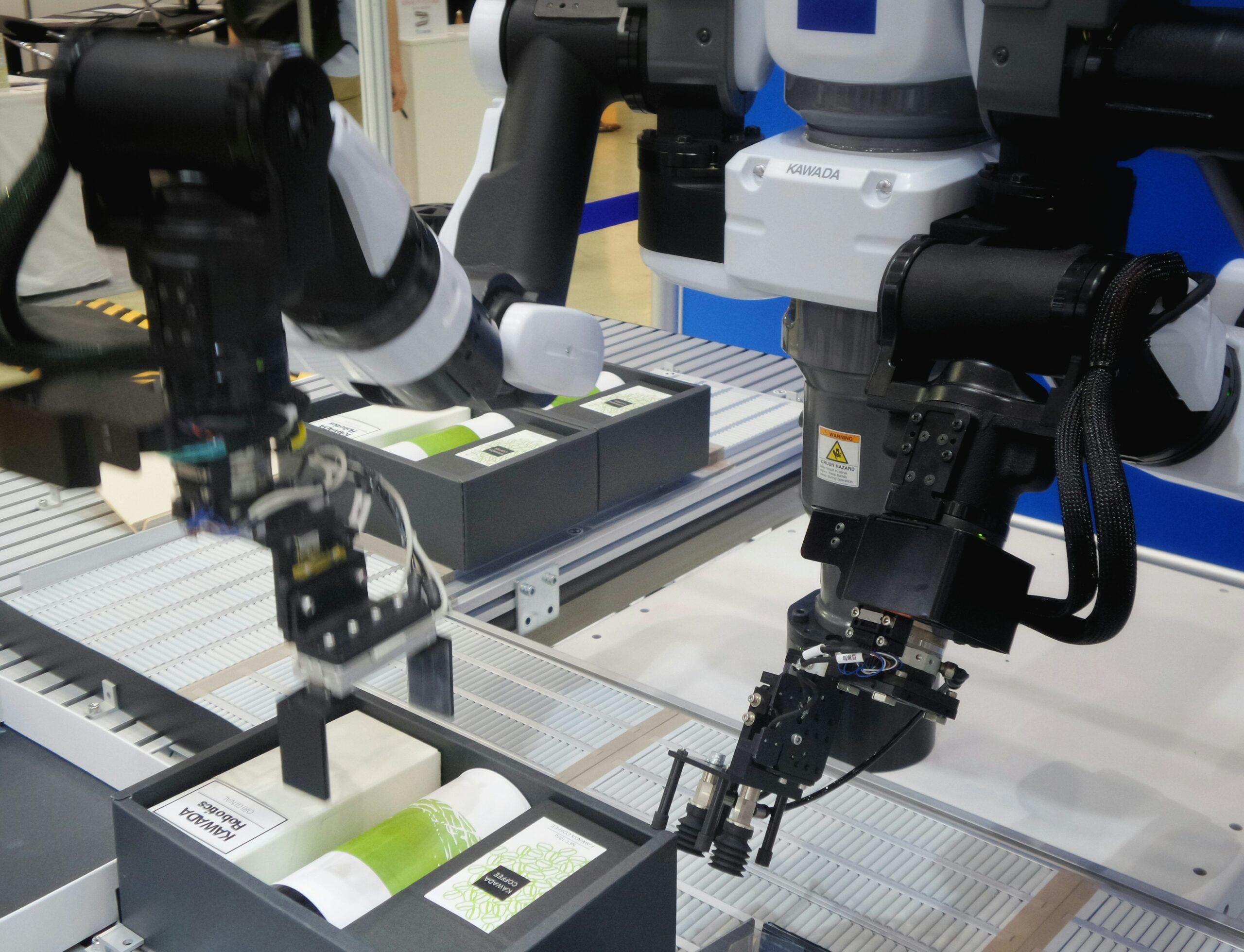Cobot arm working autonomously Cobot arm working on components.